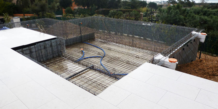 Piscine en béton et hors sol